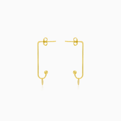 Boucles d'oreilles en or uniques avec une pièce