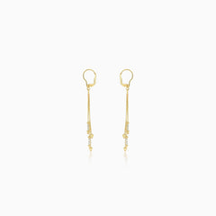 Pendientes largos de oro con cuentas