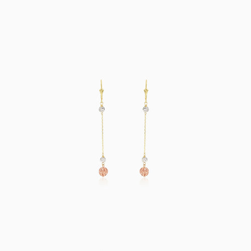 Boucles d'oreilles pendantes en or tricolore avec perles.