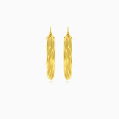 Schicke Creolen mit drehendem Design