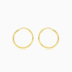 Créoles en or taillé diamant