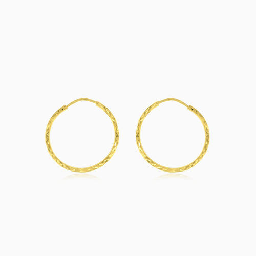 Créoles en or taillé diamant