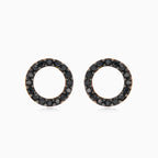 Yellow gold circle earrings with black onyx