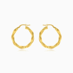 Curved yellow gold earrings