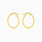 Boucles d’oreilles créoles arrondies en or lumineux