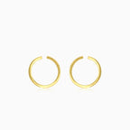 Yellow gold round stud earrings