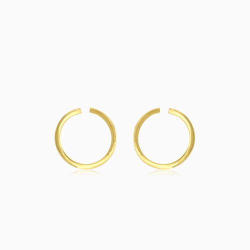 Boucles d'oreilles puces rondes en or jaune.