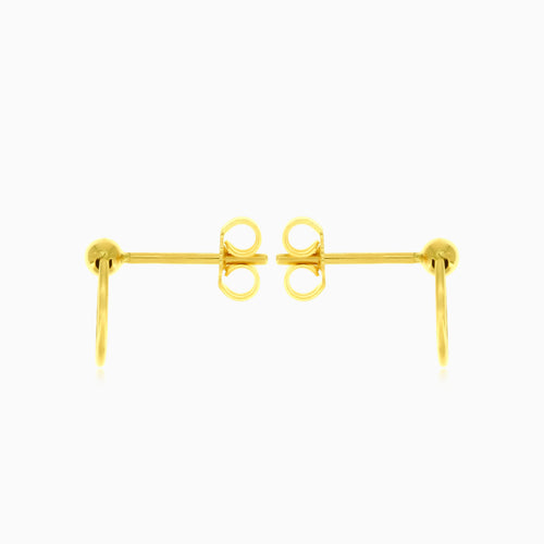 Yellow gold circle ball hoop earring