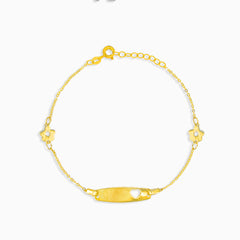 Bracelet en or avec accents floraux et plaque centrale