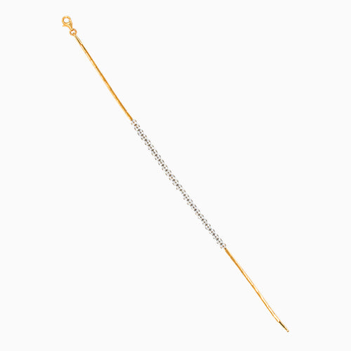 Brazalete fino de oro con eslabones y circonitas