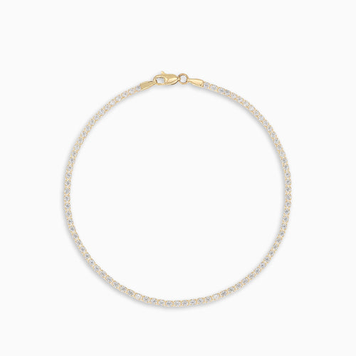 Náramek ze žlutého zlata s kubickými zirkony