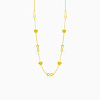 Gold necklace with hearts and infinity symbols