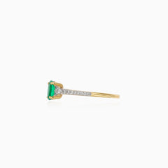 Yellow and white gold ring with diamonds and emerald