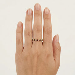 Stylish yellow gold ring with garnet and cubic zirconia