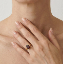 Elegant garnet emerald cut ring