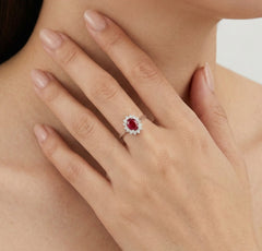 White gold ruby ring with halo of diamonds