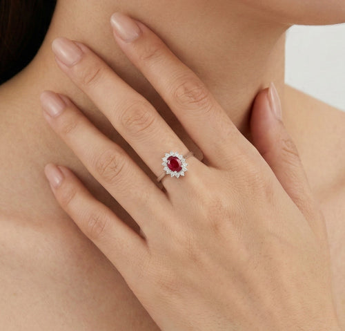 White gold ruby ring with halo of diamonds