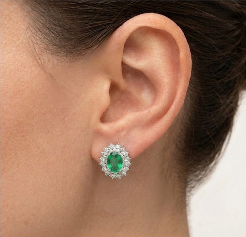 Boucles d’oreilles royales émeraude en or blanc