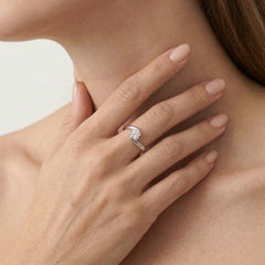 Twisted white solitaire ring