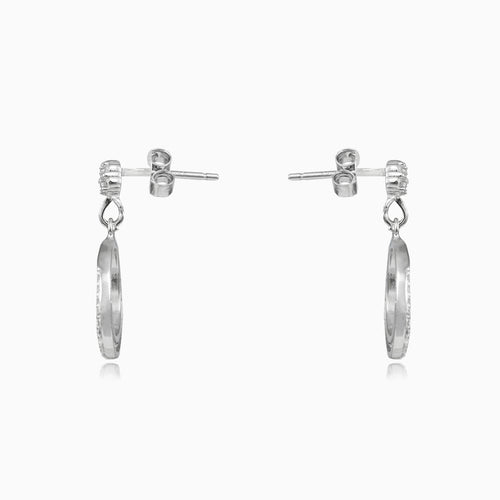 Dangling circle silver stud earrings