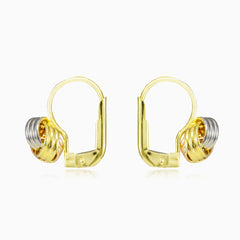 Boucles d’oreilles pendantes nouées en trois ors