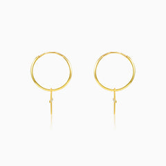 Aros de oro con cruz