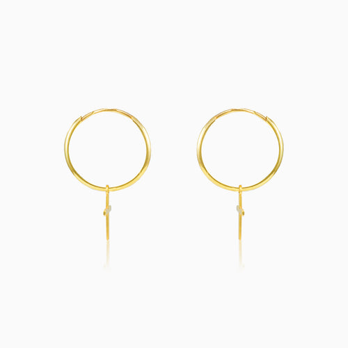 Aros de oro con cruz