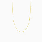Minimalistic gold cross necklace