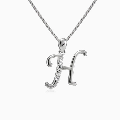 Merveilleux pendentif lettre H en argent sterling orné de zircone cubique.