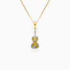 Zlatý přívěsek kytara