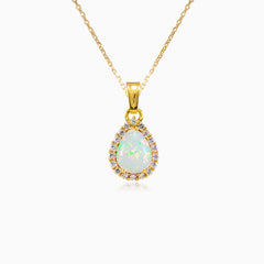 Péndulo de ópalo blanco en corte pera y oro