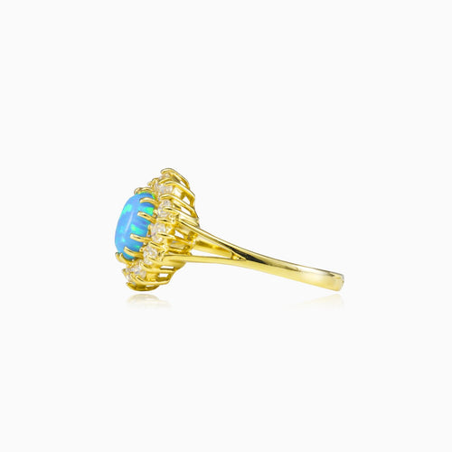 Královský zlatý prsten s modrým opálem