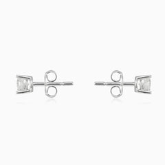 Classic four-prong solitaire earrings